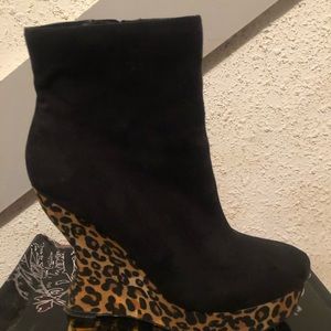 Black platform with cheetah print heel